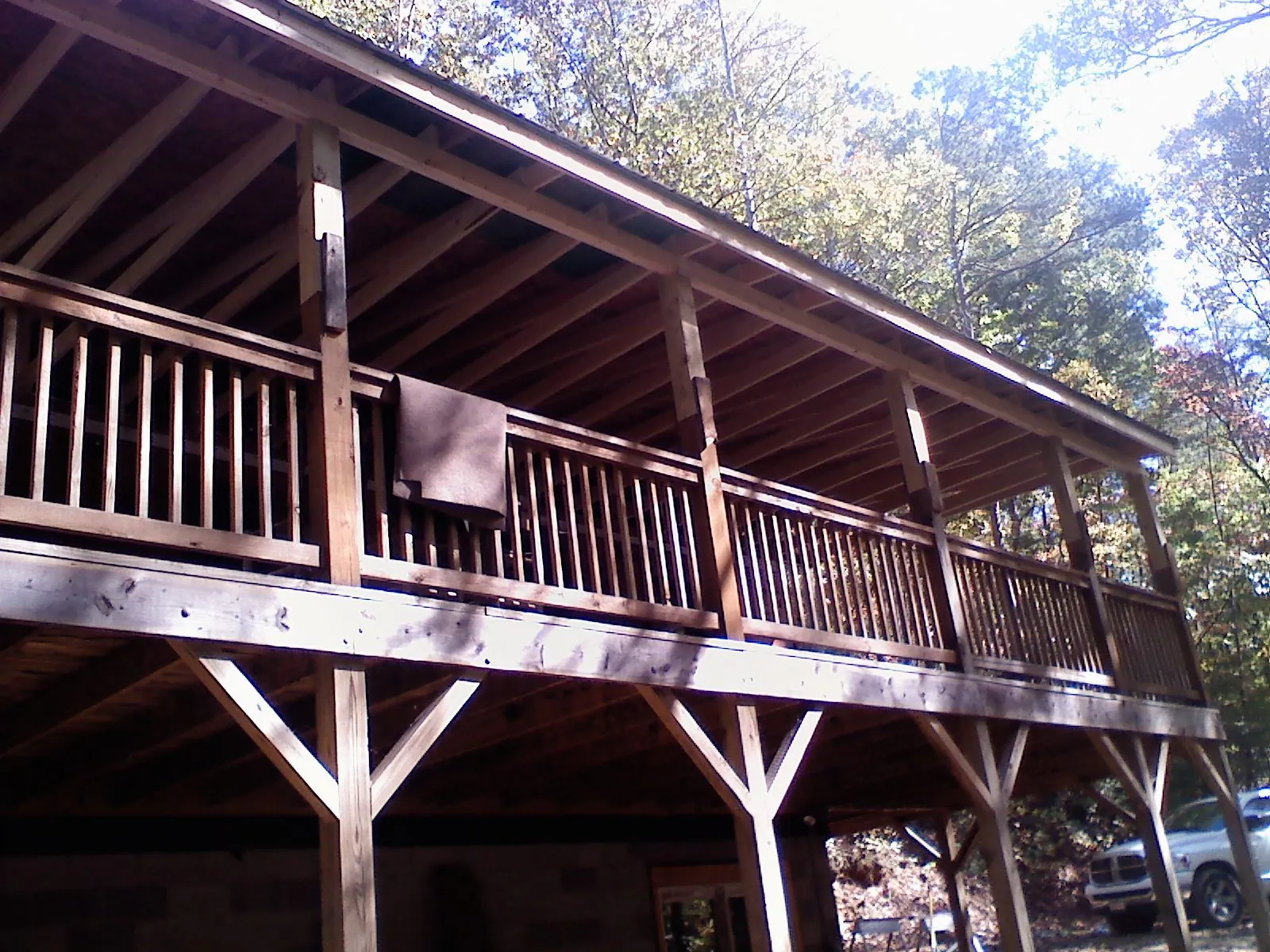 Timber framing under a new elevated porch and deck — Roof Leak Repair in Macksburg by Roofing Brothers